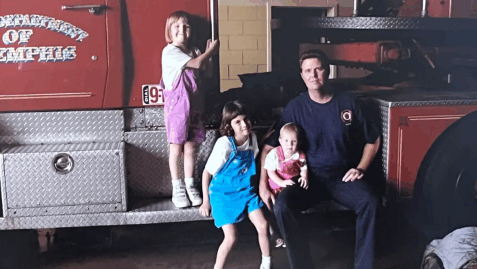 Memphis Firefighter David Pleasant with three of his daughters in 2003